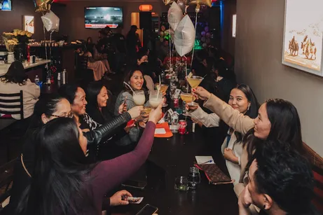 Group of friends having dinner together
