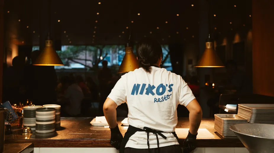 A team member at the open kitchen of Niko’s Resto at KINO in Rotterdam.