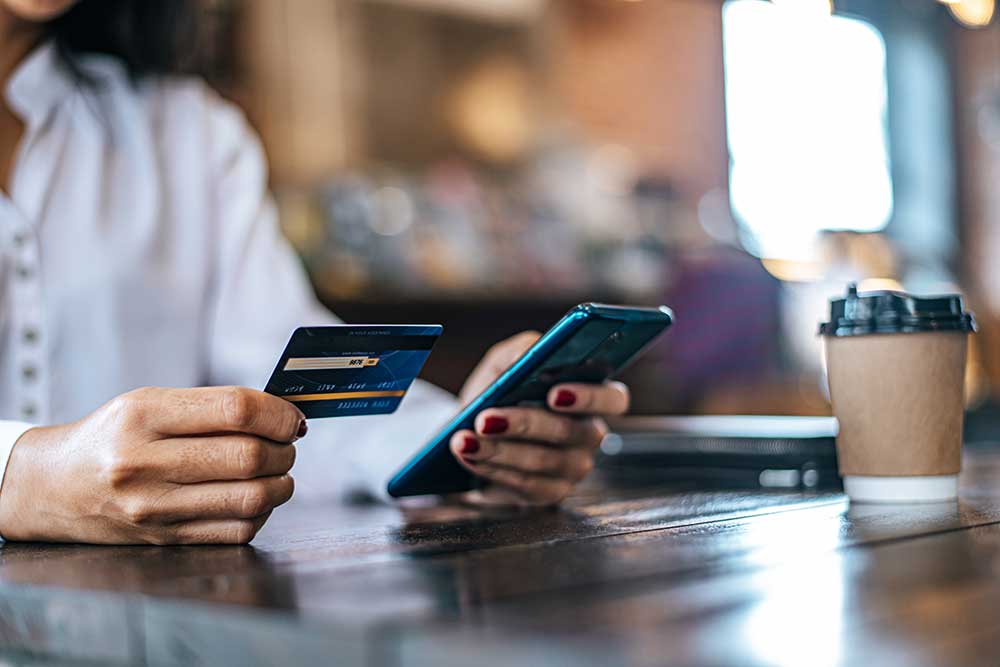 Person paying with a card